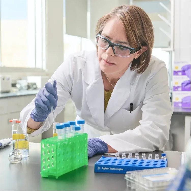 Lab technician working with test tubes