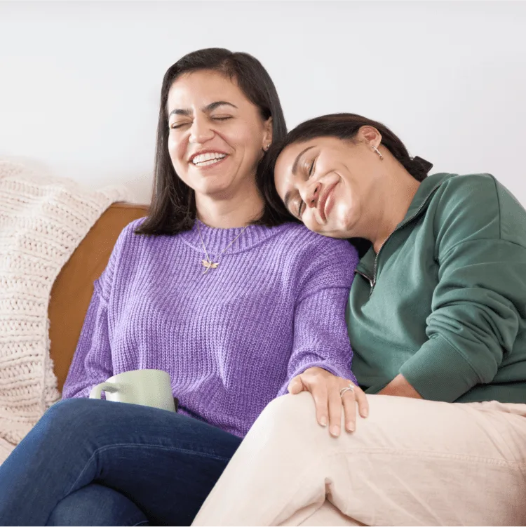 Two women sitting together
