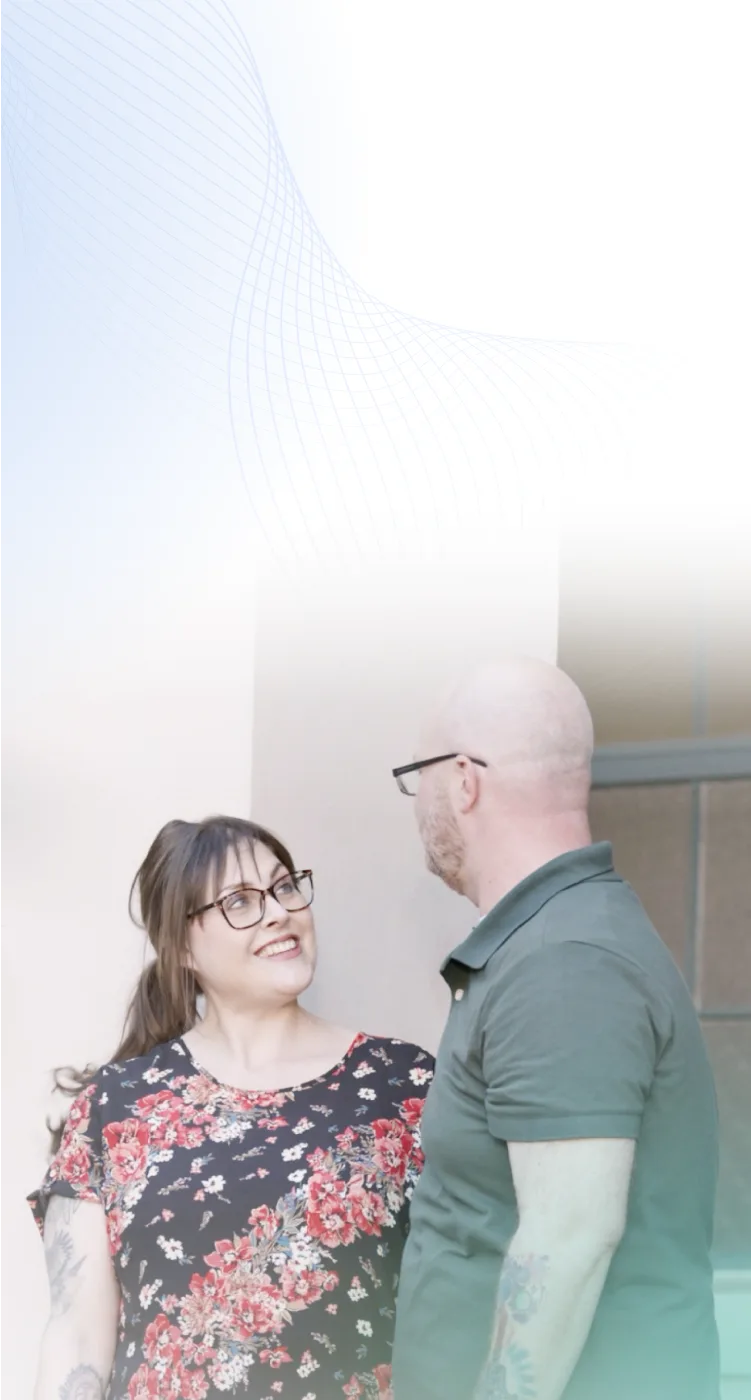 Husband and wife embracing