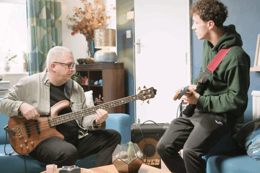 Husband and son playing music together