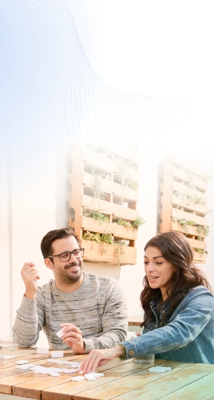 Couple playing dominoes